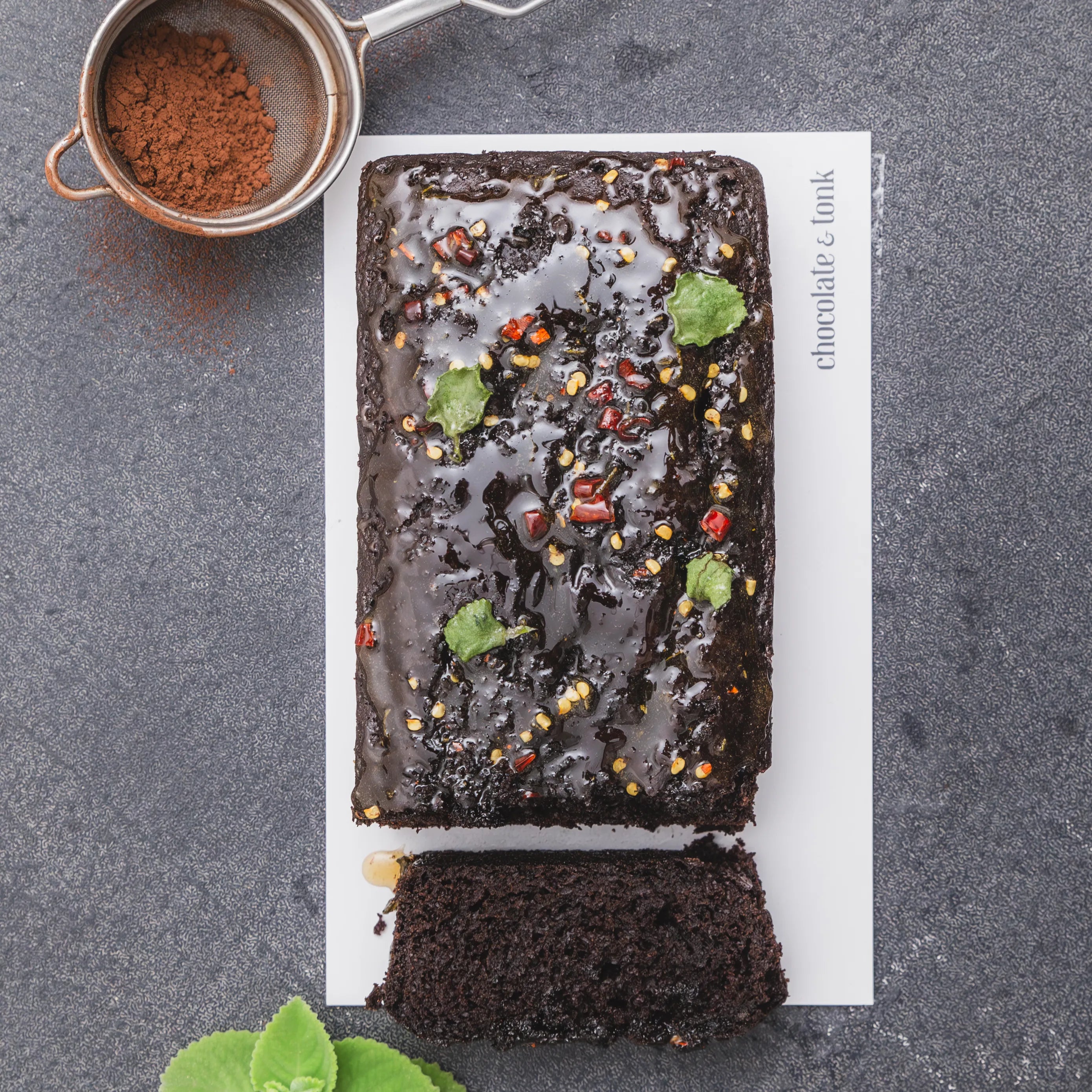 Chocolate loaf cake glazed with hot honey and spurflower