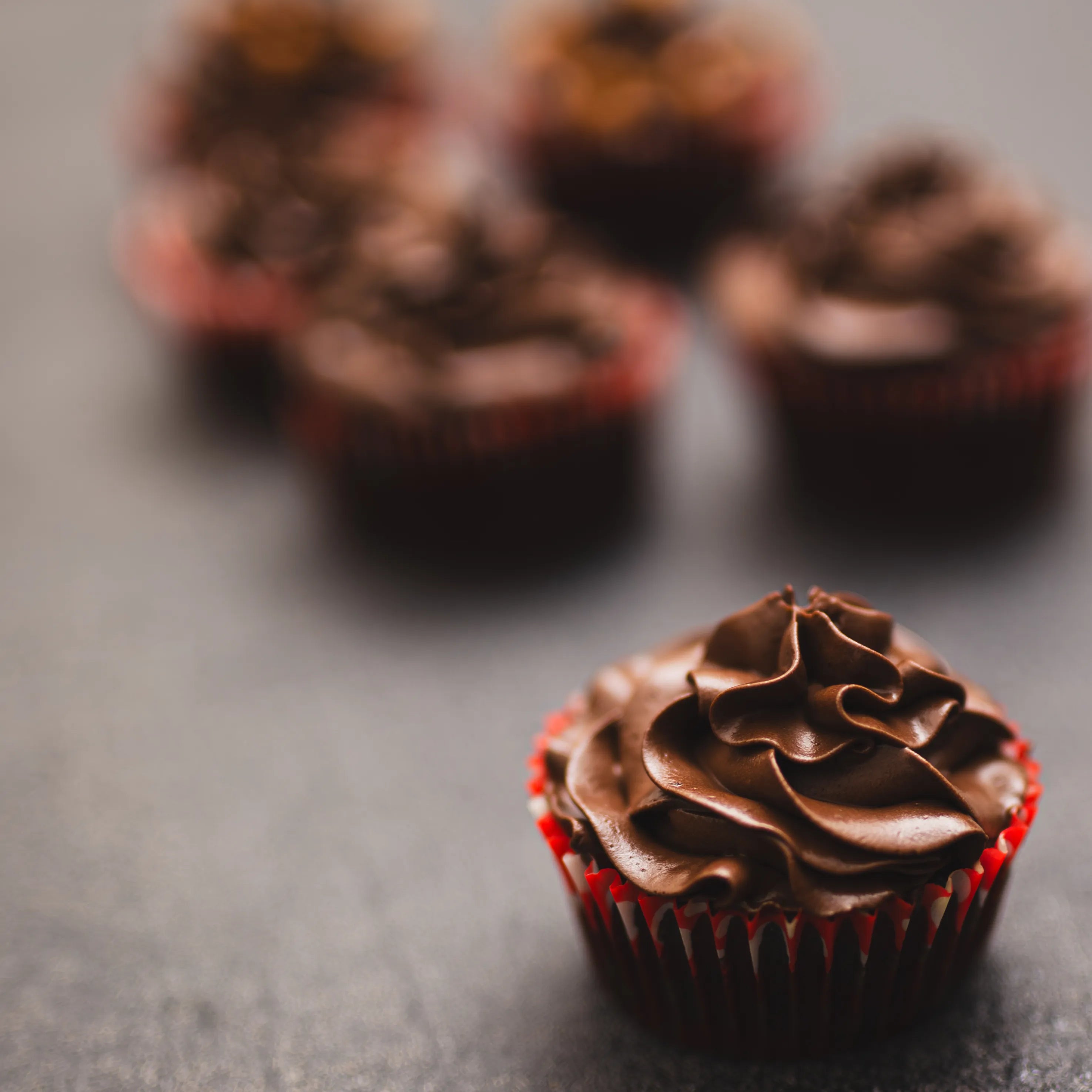 Moist chocolate cupcakes topped with chocolate coffee ganache