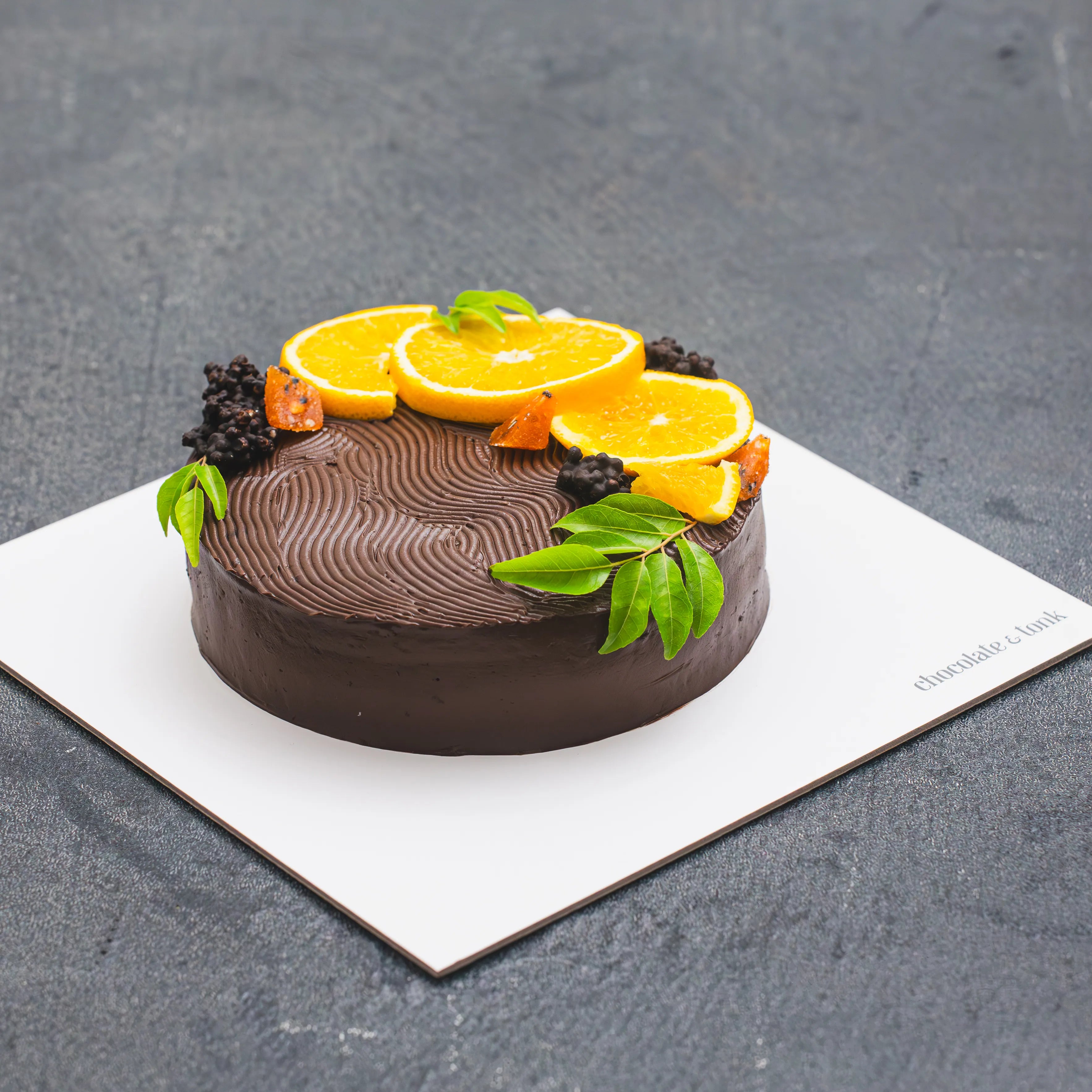 Vibrant orange chocolate cake infused with alcohol for an extra kick